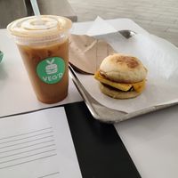 Cold brew w/ oat milk and agave & sausage, egg, and cheese muffin w/o veg'd sauce at VEG'D in Costa Mesa