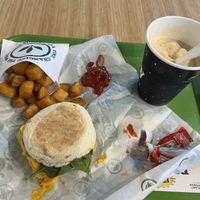 Breakfast sandwich with breakfast potatoes and Heathbar Snow Days treat  at Plant Power Fast Food in Sacramento