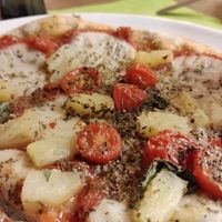 Vegan pizza mozzarella with pineapple. at Sassy's in Oostende