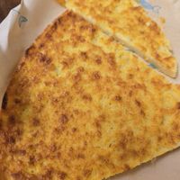 Farinata (chickpea flour pie) at Pan & Pumate in Manarola