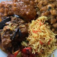 Aubergine veg side, garlic rice, chickpeas and Quorn lentil Dansac. All delicious! at Green Spice in Dartford