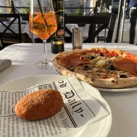 Croquette, pizza (ham, mushroom, artichoke, olive), and spritz  at La Soffitta Renovatio in Rome