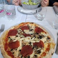 Vegan Pizza cappriciosa and in the background th vegan Caesar salad (which was apparently not as good as the pizza) at La Soffitta Renovatio in Rome