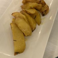 Patatas al horno (en la carta con comida de origen animal)   at La Soffitta Renovatio in Rome