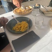 carbonara with GF pasta and pizza with smoked provoke cheese and bacon on GF crust at La Soffitta Renovatio in Rome