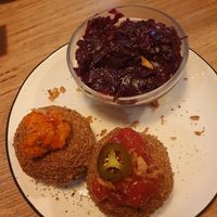 Chimichurro & Salsaknödel mit Rotkraut-Granatapfel-Salat at Knödel Manufaktur in Vienna