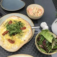 Vegan pizza with white base and vegan coleslaw  at The Garden in Portsmouth