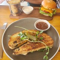 $14 cheese toastie and burger and wedges $20 or so. It was edible but bland. Bit disappointed. at Nurcha Kawana in Birtinya