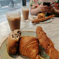 Chai Latte, Pain au chocolat, croissant, tomato bread at Land & Monkeys - Amsterdam in Paris