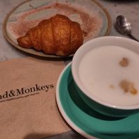 Coffee and croissant at Land and Monkeys, Amsterdam at Land & Monkeys - Amsterdam in Paris