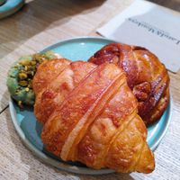 Croissant, cinnamon buns and pistachio cookie at Land & Monkeys - Amsterdam in Paris