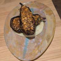 Berenjena asada pil-pil de coliflor, chimichurri y dukkah at Suquía Café in Mallorca