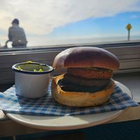 Vegan breakfast bap....mushroom, hash brown, pattie, avo on side at Perch on Lancing Beach in Lancing