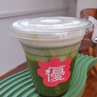 Special matcha latte with cream on top at Vegan Gyoza Yu Cafe in Tokyo