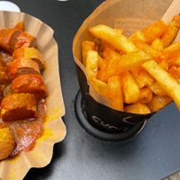 Currywurst with mild currysauce and french fries   at Curry & Co in Chemnitz