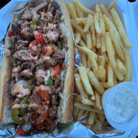 The submarine (Philly cheesesteak) with added jalapeños. Side of fries and ranch. ALL VEGAN 😍 at The Vegan Spot - Food Truck in Fayetteville