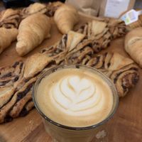 Flat White meets Franzbrötchen . at Shluk in Trier