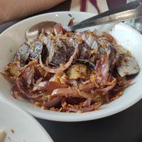 Patatas confitadas con morcilla vegana y cebolla pochada. at Acherito in Jaca