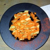 Patatas bravas con salsa de tomate y tabasco at La Lola in Jaca