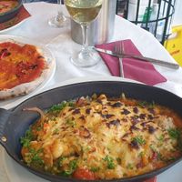 Baked vegan gnocchi and tomato and chilli garlic bread at Trattoria in Bowness-on-windermere