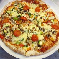 Veggie pizza made vegan at Trattoria in Bowness-on-windermere