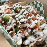 Asada nachos 😍  at De La Tierra Vegan Food Truck in San Jose