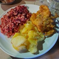 Brown Rice with pumpkin Zucchini and beets, chickpeas flour and vegetable fritters, baked potatoes with chili at La Cucina Dei Colori in Catania
