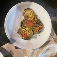 Aubergine with fresh tomatoes   at La Cucina Dei Colori in Catania