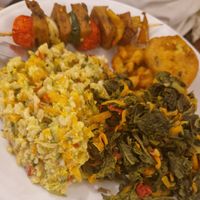 Rice, sounash, fritters amd a spear with veg and faux meat at La Cucina Dei Colori in Catania