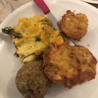 Lasagne, arancino, chickpea fritter, rice ball (anticlockwise)  at La Cucina Dei Colori in Catania