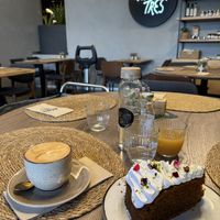 Carrot cake and flat whitee  at Noranta Tres in Escaldes-engordany