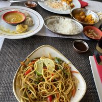 Vegi Momos, Yakisoba Noodles and cauliflower potato curryy  at Buddha & Sakura in Calheta