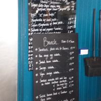 Smoothies, sausage ciabatta or avocado, chilli and lime on sourdough for breakfast. Pizza is vegan margarita with basil pesto. at Blue Bar in Porthtowan
