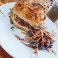 Vegan sausage, cheese, tomato & avocado breakfast tiger roll  at The Beet Box in Newquay
