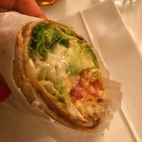 Wheat tortilla with avocado and yummy stuff at Loving Hut in Menton