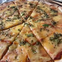 Pizza with broccoli   at The Finch in Santorini