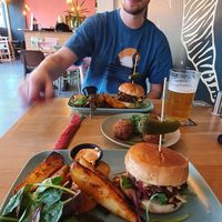 Charlie getting ready for a pint. at Meat is Dead in Leeds