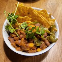 Spicy chili with beans, corn, jalapeno, cilantro, corn at Lanbroa in Pamplona