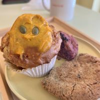 Pumpkin muffin and partially eaten caramel tea cookie and purple sweet potato scokie  at Ovgo B.A.K.E.R Edo St in Tokyo