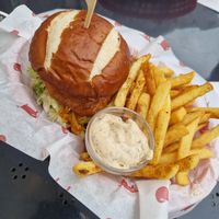 Buffalo fried chick'n burger, fries, and truffle mayo at The Tavern in Prague