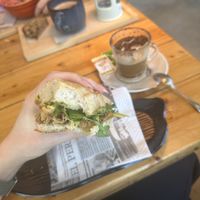 Rockefeller topping on Bianca bread  + cappuccino  at Shanao Cafe in Malaga