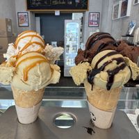 Two ice cream cones. Pistachio and chocolate to the right.  at Green Scoop Vegan in Berlin