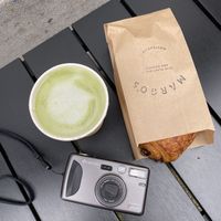 matcha latte with oat milk and pain au chocolat   at Margo's Amsterdam - Jordaan in Amsterdam