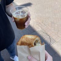 An iced black coffee and pain au chocolat  at Margo's Amsterdam - Jordaan in Amsterdam