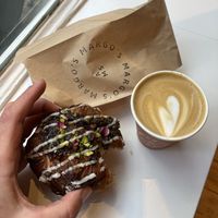 Pistachio rose danish / oat flat white   at Margo's Amsterdam - Jordaan in Amsterdam