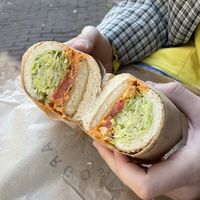 Crispy « chicken » chili mayo sandwich on while wheat oat bread  at Margo's Amsterdam - Jordaan in Amsterdam