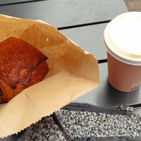 Huge chocolate croissant with a jasmine tahini latte  at Margo's Amsterdam - Jordaan in Amsterdam