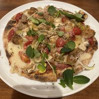  at Unique (V) Pizzeria SUKHASANA in Osaka