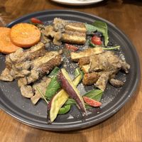 Homemade tempeh  at Unique (V) Pizzeria SUKHASANA in Osaka