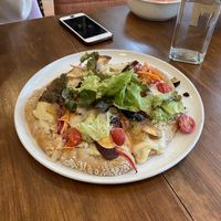 vegetable and cashew pizza  at Unique (V) Pizzeria SUKHASANA in Osaka
